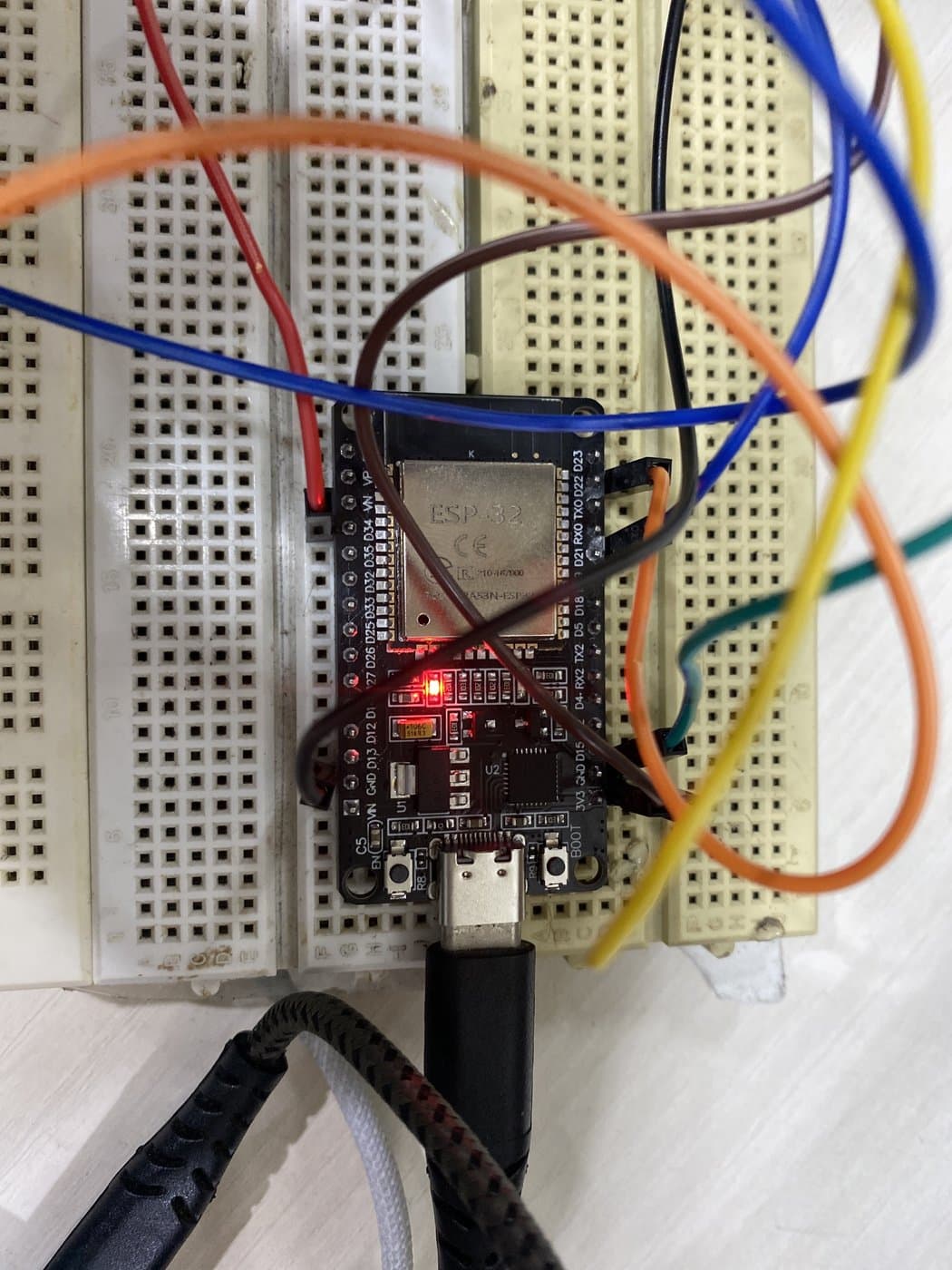 The ESP32 development board seated on the breadboard, powered over USB-C.